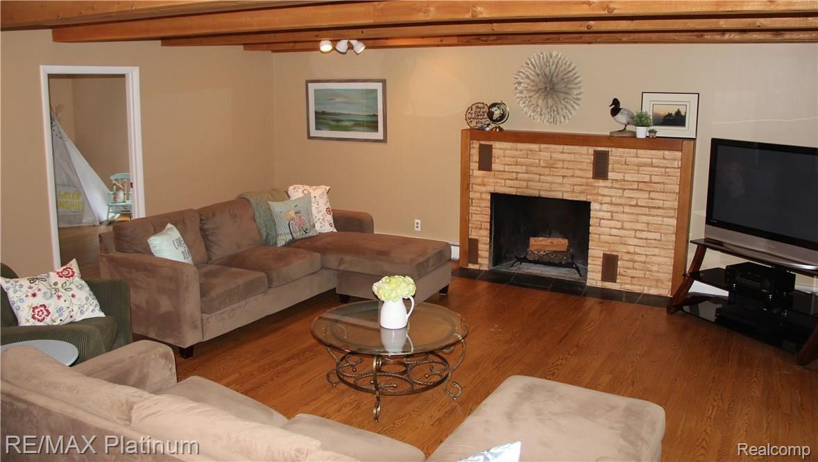 5775 Bullard Road Fenton, MI 48430 - Photo 11 of 50 Natural Wood Burning Fireplace.
