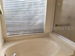 a view of a door and a window