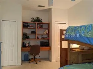 a view of a workspace with furniture