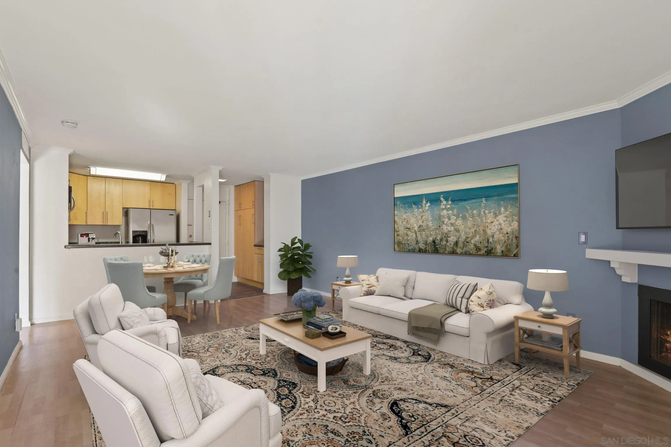 6757 Friars Road, Unit 13 San Diego, CA 92108 - Photo 3 of 15 a living room with furniture and a flat screen tv