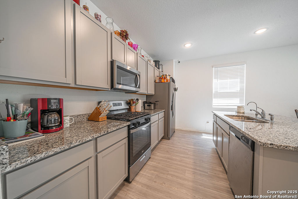 4422 Chandler Road, Unit 20 San Antonio, TX 78222 - Photo 11 of 38 a kitchen with granite countertop lots of counter top space