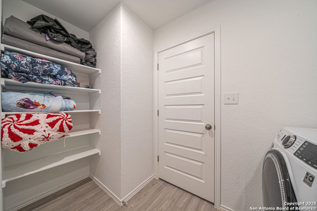 4422 Chandler Road, Unit 20 San Antonio, TX 78222 - Photo 14 of 38 a view of walk in closet with clothes and shoes