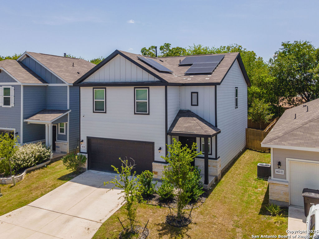 4422 Chandler Road, Unit 20 San Antonio, TX 78222 - Photo 2 of 38 a front view of a house with a yard