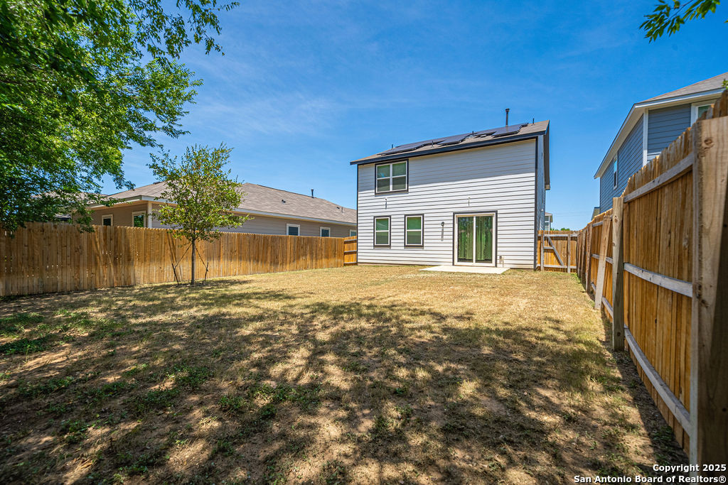 4422 Chandler Road, Unit 20 San Antonio, TX 78222 - Photo 33 of 38 a front view of a house with a yard