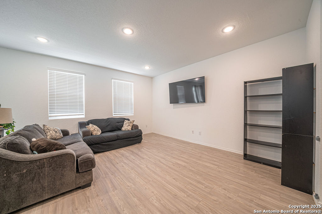 4422 Chandler Road, Unit 20 San Antonio, TX 78222 - Photo 5 of 38 a living room with furniture and a couch