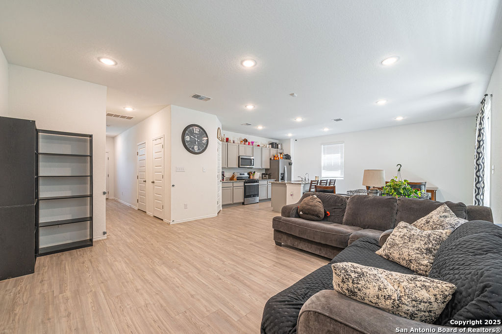 4422 Chandler Road, Unit 20 San Antonio, TX 78222 - Photo 6 of 38 a living room with furniture and a wooden floor
