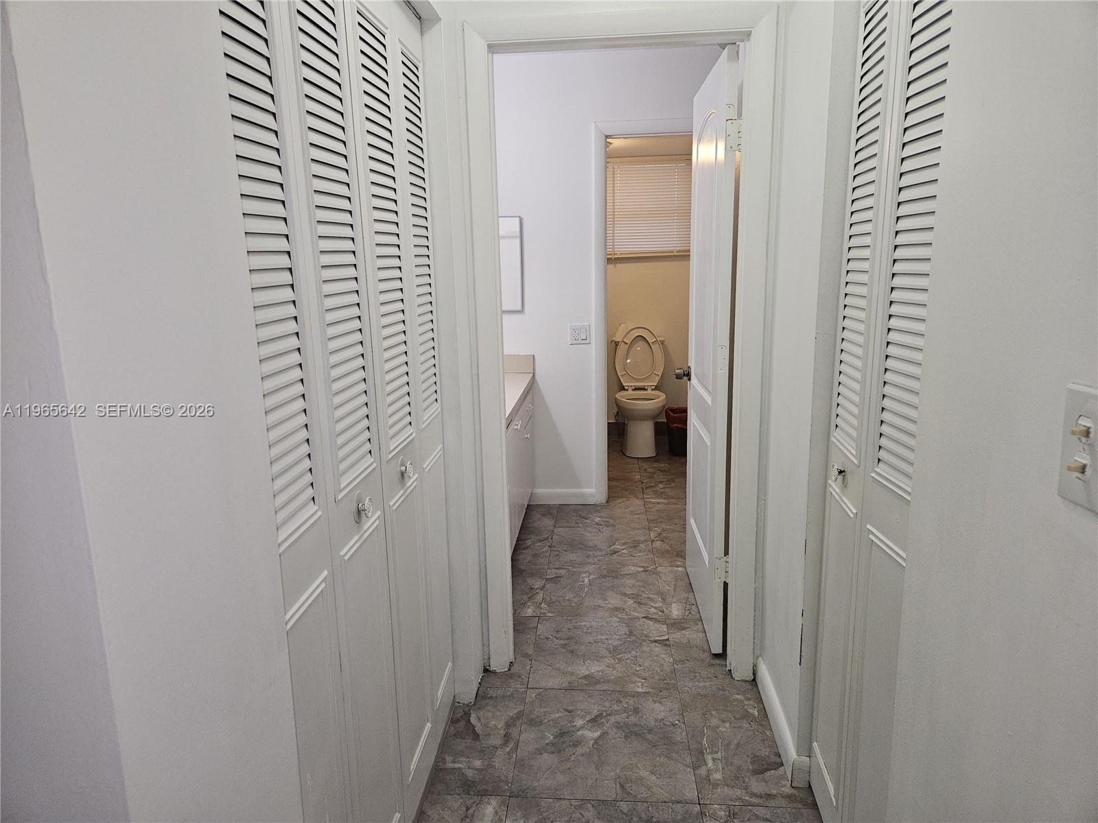 7610 Stirling Road, Unit 102C Davie, FL 33024 - Photo 7 of 11 a view of a bathroom