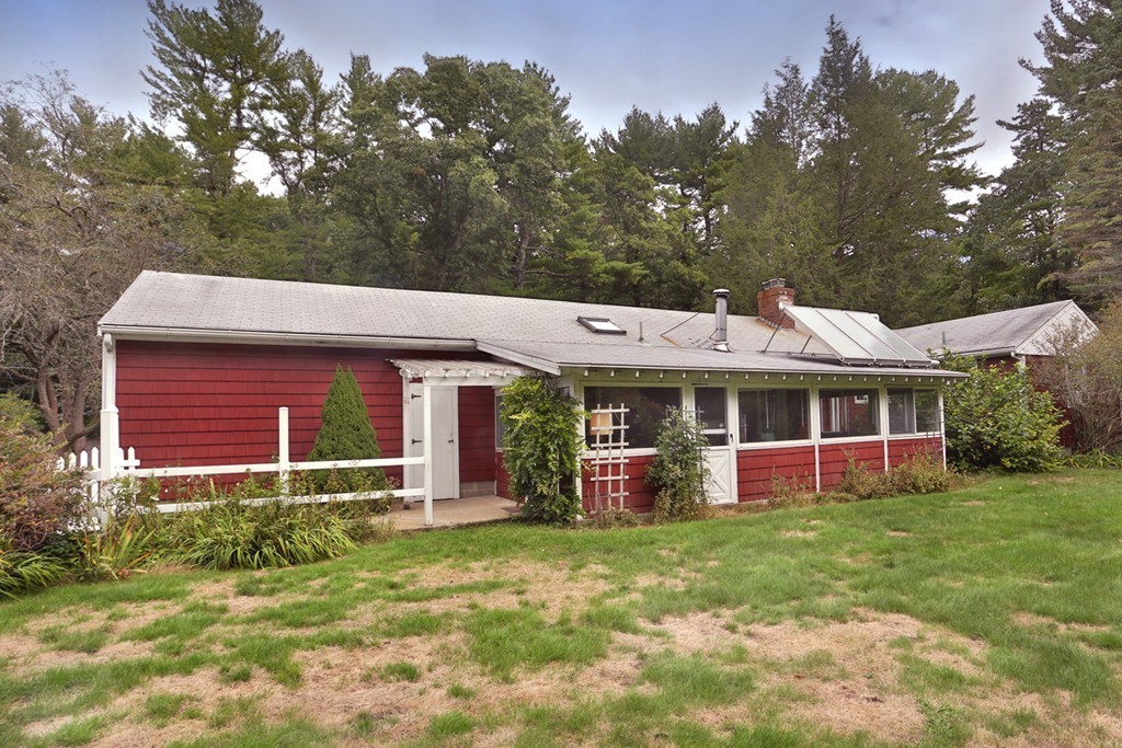 7 Stagecoach Road Topsfield, MA 01983 - Photo 4 of 26 a view of a house with a backyard porch and sitting area