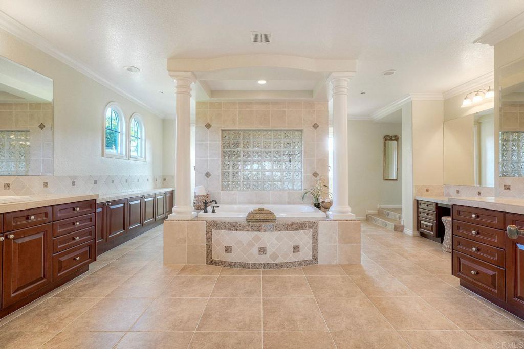30893 Villa Toscana Road Bonsall, CA 92003 - Photo 47 of 51 Generous space with jetted tub, walk in shower with dual shower heads & 2 water closets