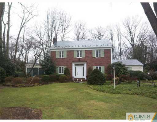 80 Stafford Road Colonia, NJ 07067 - Photo 1 of 10 a front view of a house with a yard