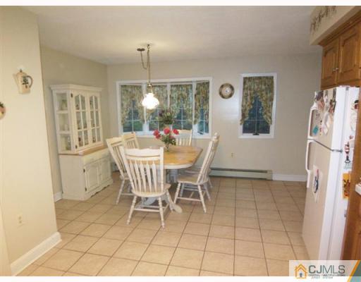 80 Stafford Road Colonia, NJ 07067 - Photo 5 of 10 a dining room with furniture and window