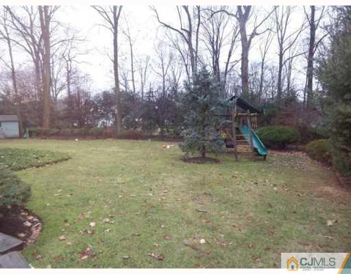 80 Stafford Road Colonia, NJ 07067 - Photo 10 of 10 a backyard of a house with lots of green space