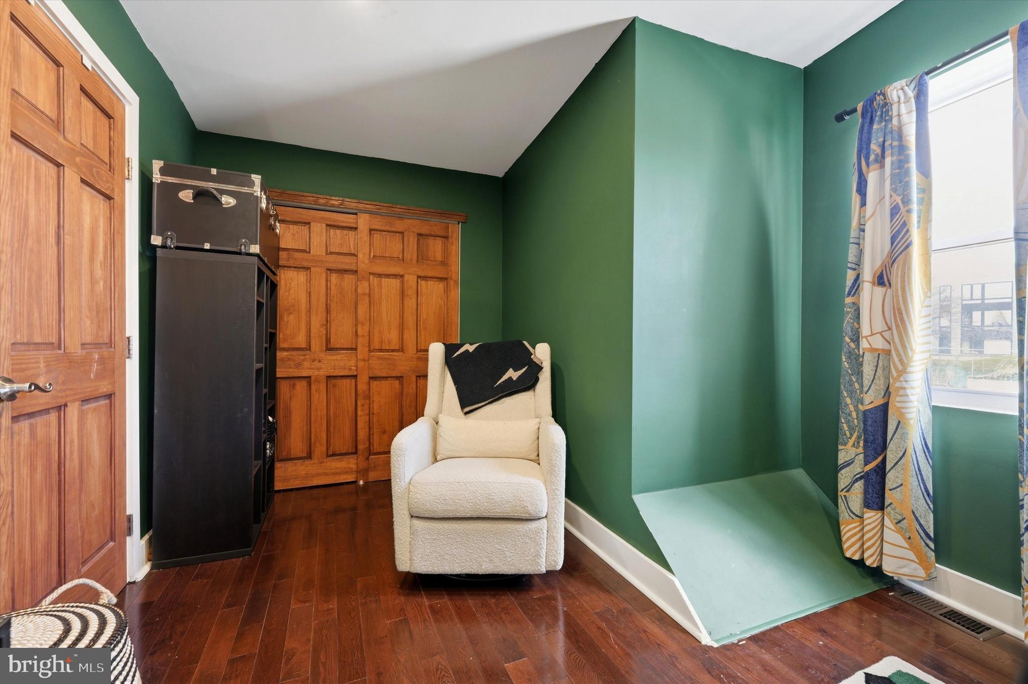 2152 East Letterly Street Philadelphia, PA 19125 - Photo 20 of 24 a bedroom with a bed and a window