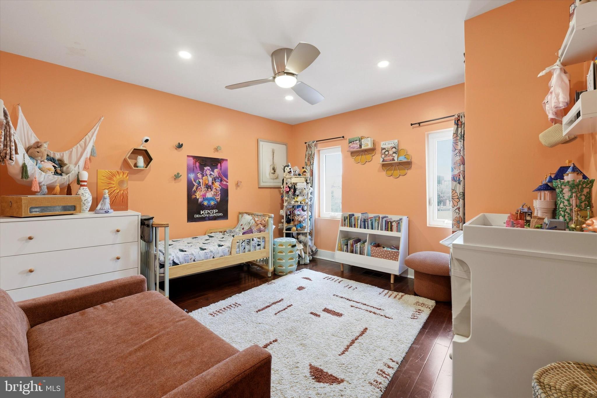 2152 East Letterly Street Philadelphia, PA 19125 - Photo 21 of 24 a bedroom with furniture and a flat screen tv