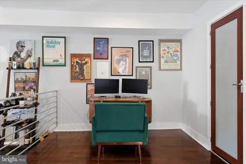 a workspace with furniture and window