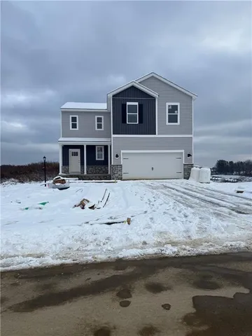 a view of a house with a snow