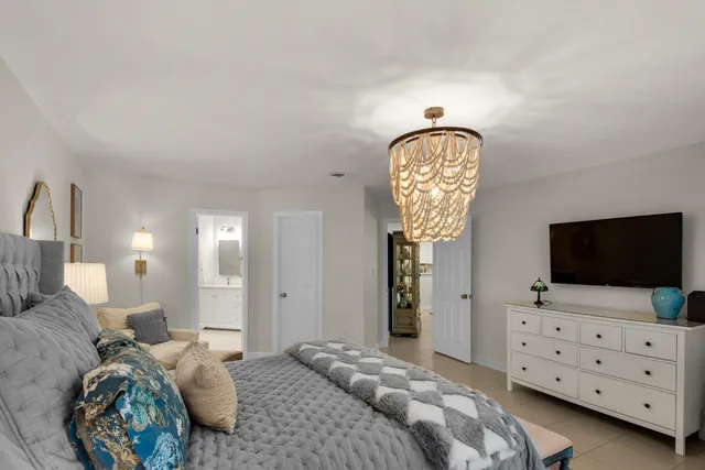 a bedroom with bed and window