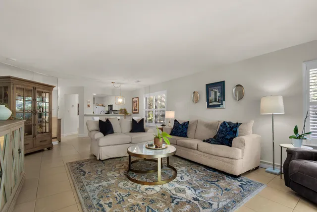a living room with furniture and a couch