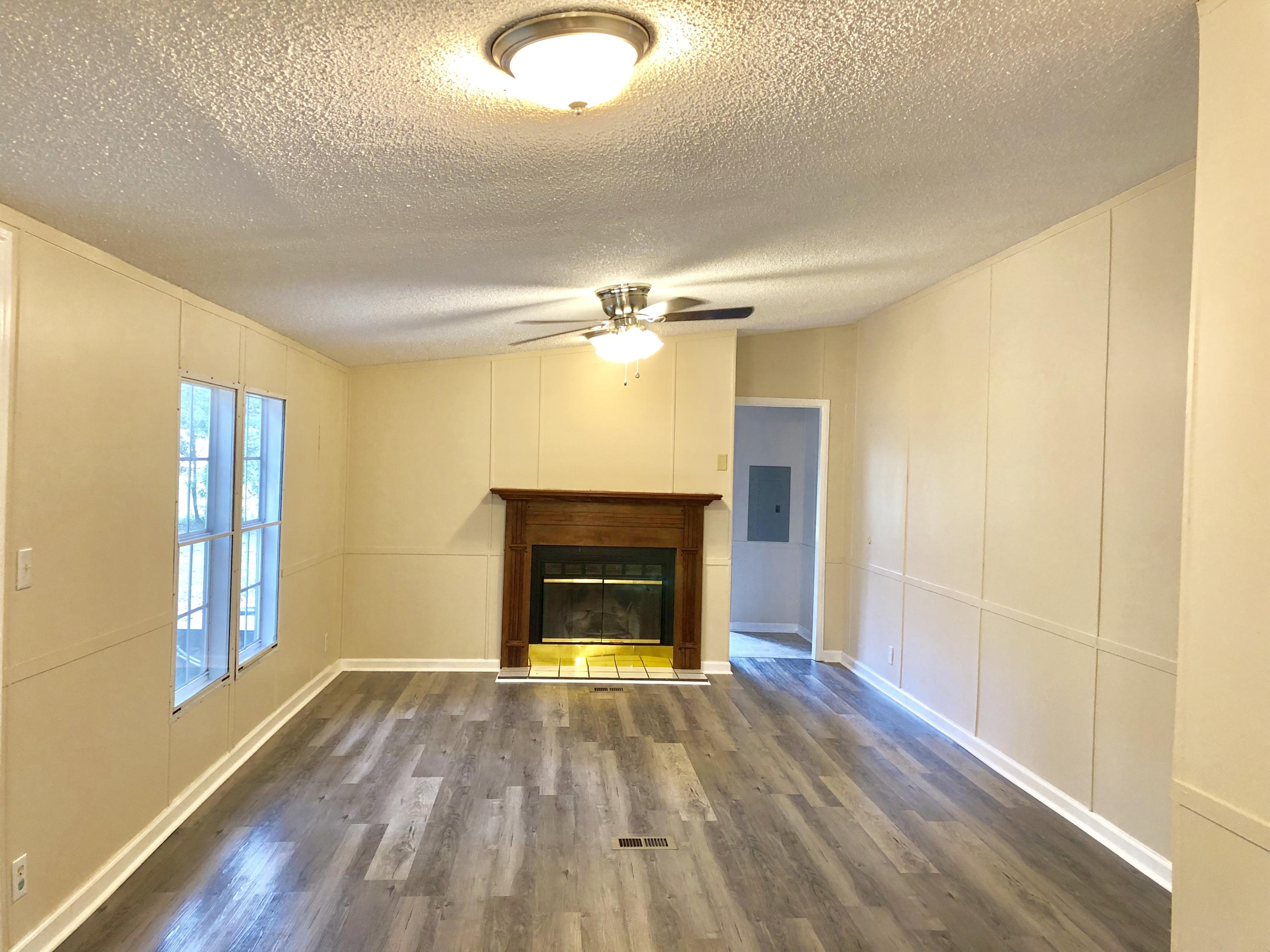 7725 Pleasant Grove Road Round O, SC 29474 - Photo 14 of 36 Den & Fireplace