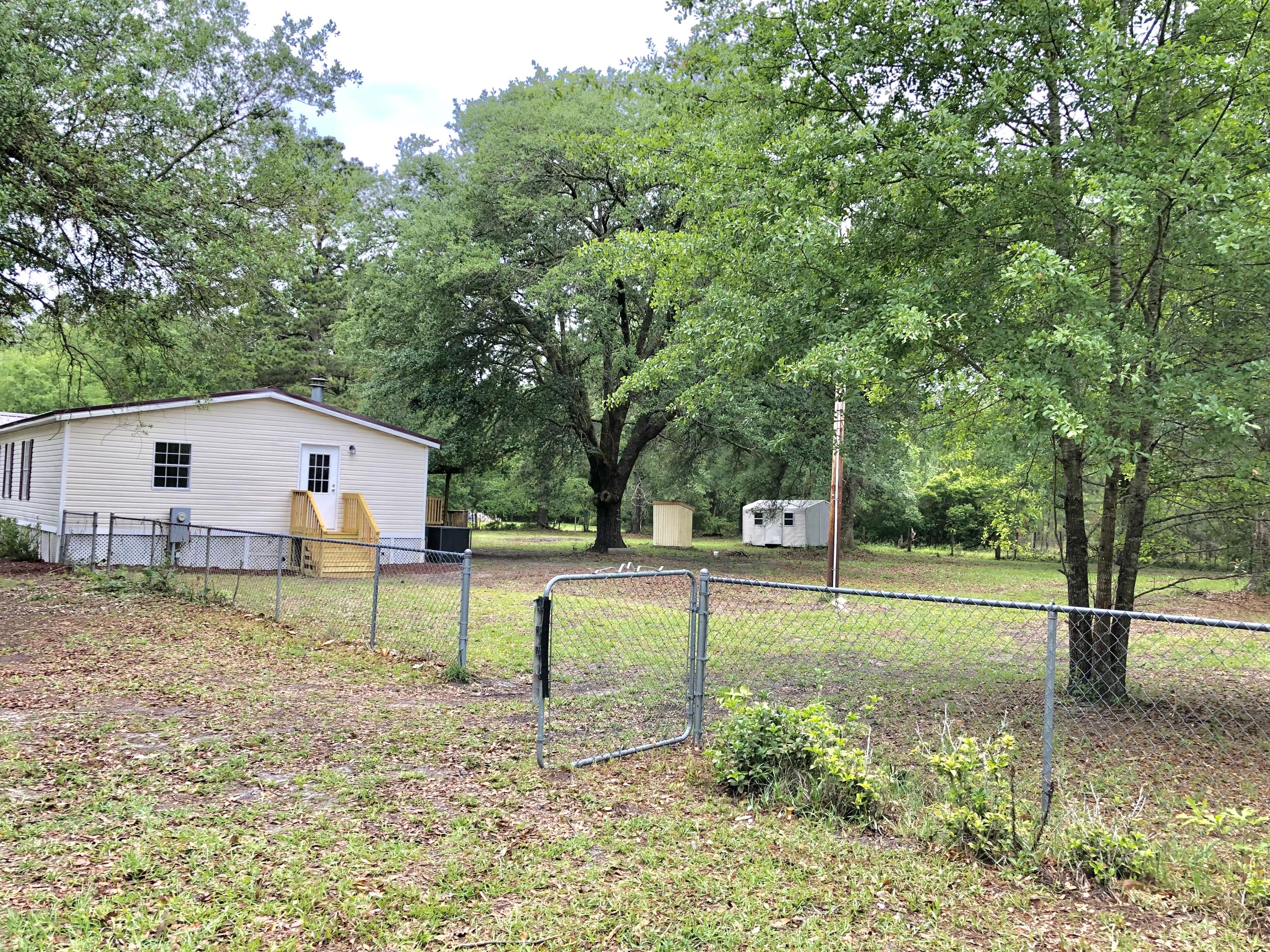 7725 Pleasant Grove Road Round O, SC 29474 - Photo 33 of 36 Fenced in Backyard
