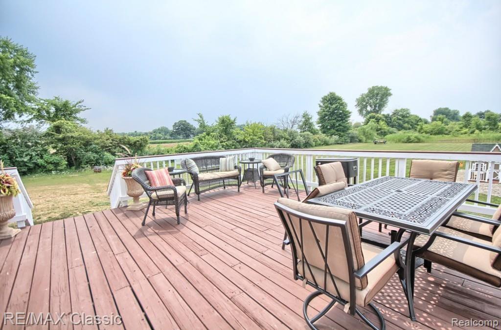 8216 Bunton Road Willis, MI 48191 - Photo 27 of 32 Deck.jpg