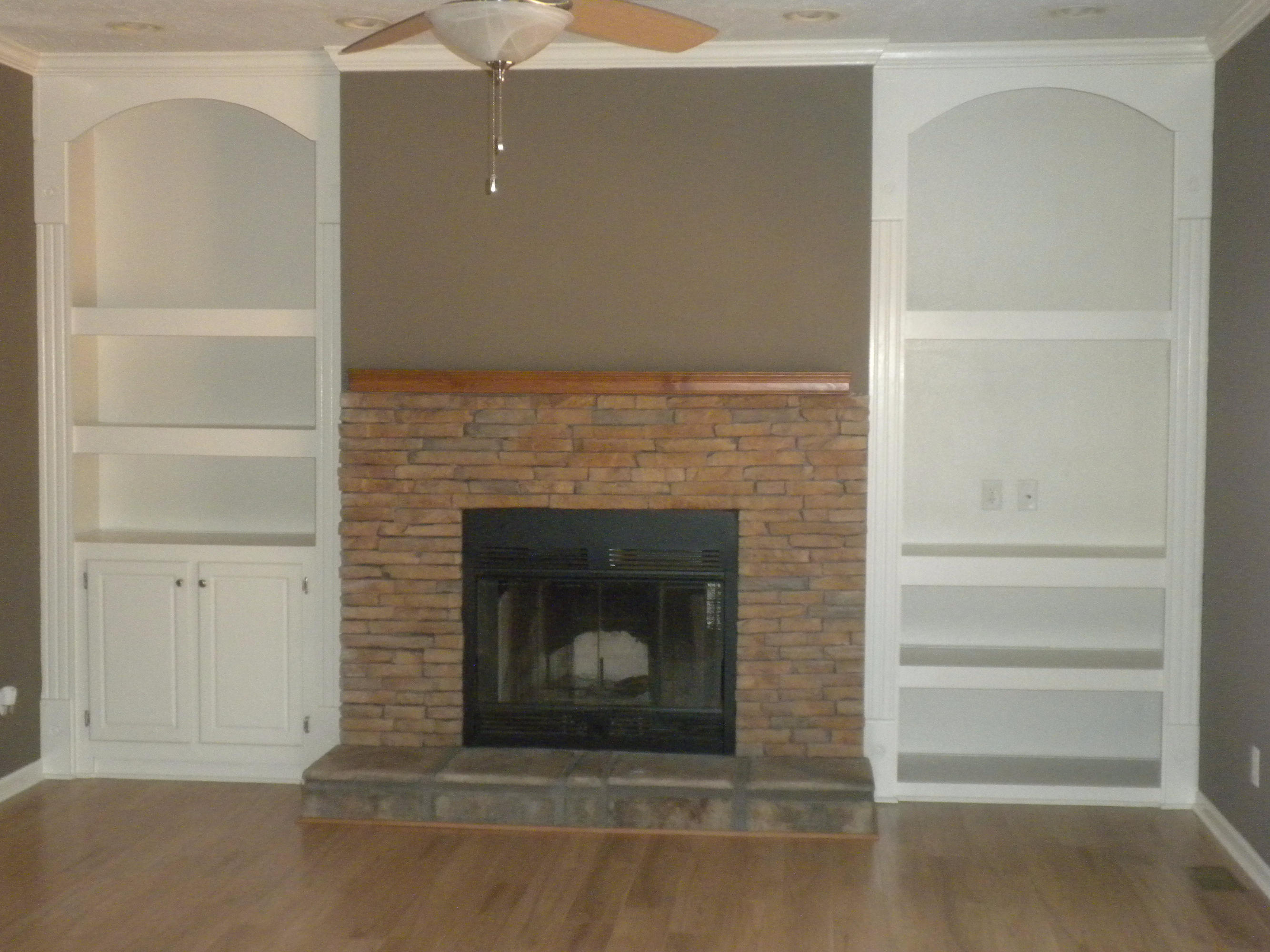 434 Miller Road Clinton, TN 37716 - Photo 21 of 40 Fireplace with bookshelfs on side