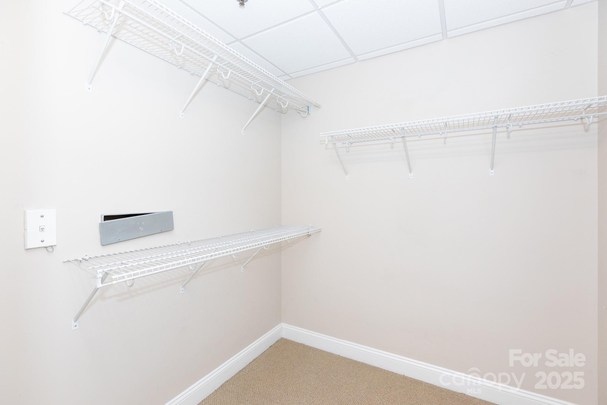 3920 Sharon Road Charlotte, NC 28211 - Photo 17 of 38 a view of small space with empty racks