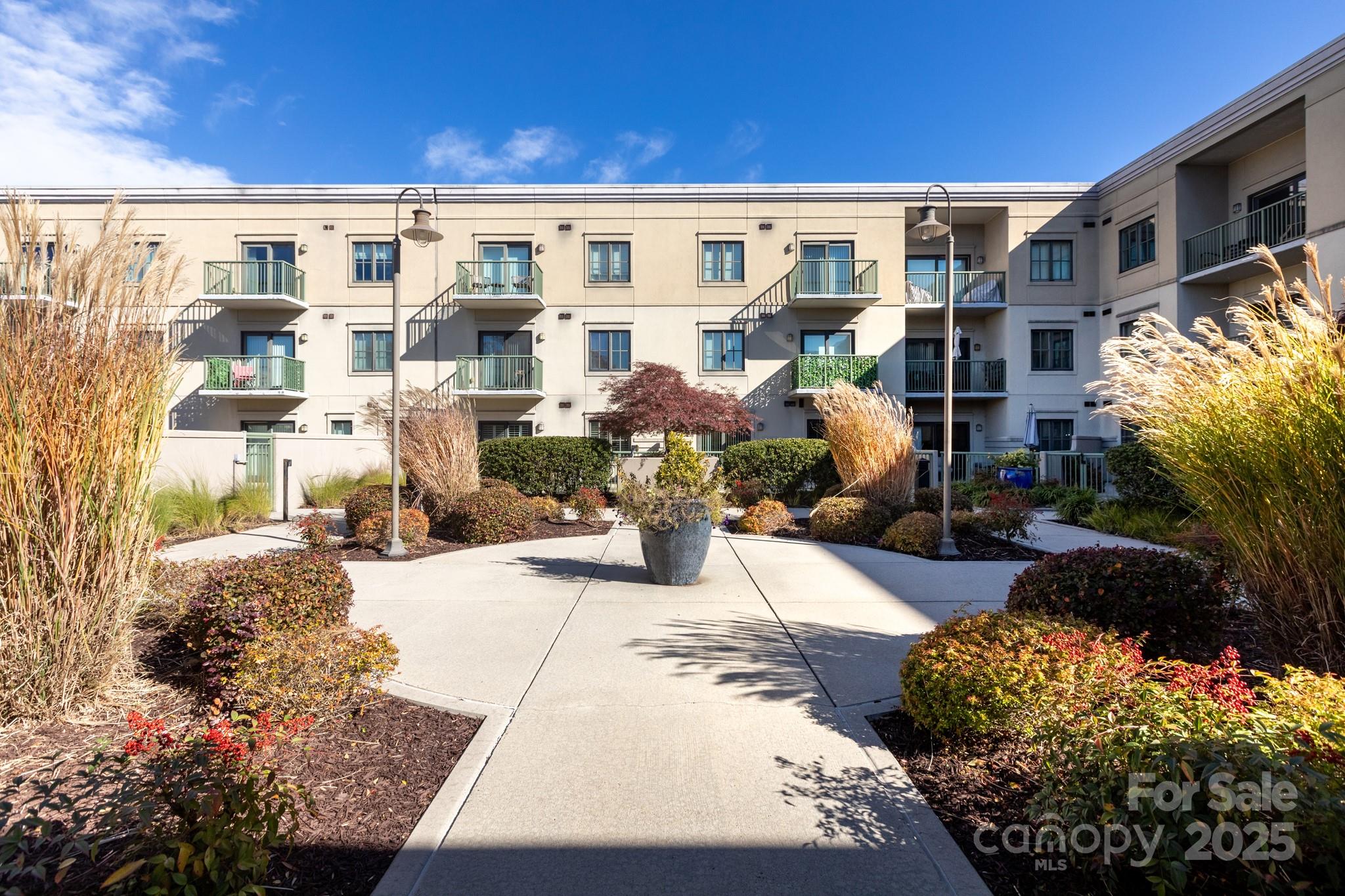 3920 Sharon Road Charlotte, NC 28211 - Photo 33 of 38 a view of a living room and a yard