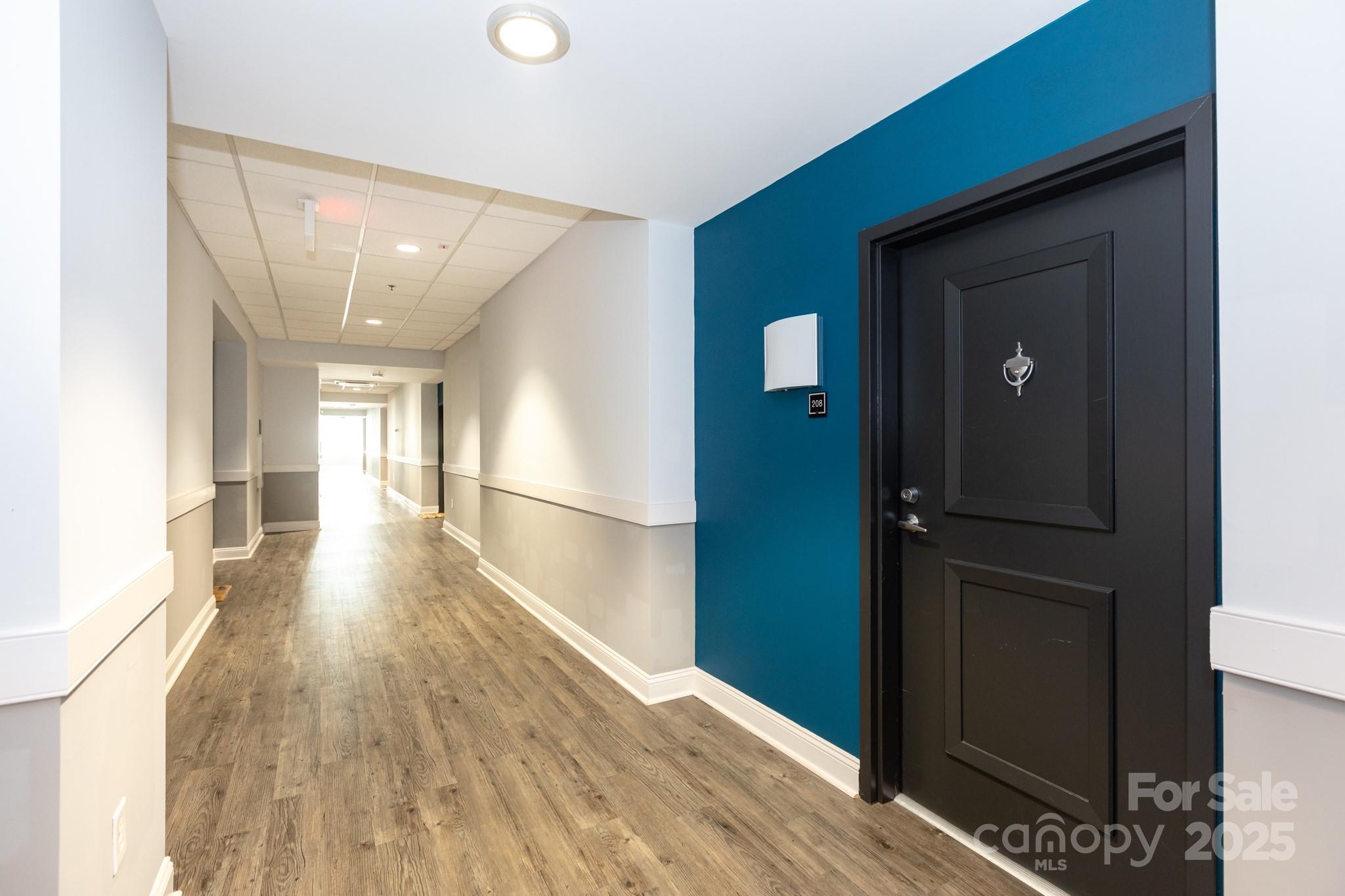 3920 Sharon Road Charlotte, NC 28211 - Photo 37 of 38 a view of hallway with wooden floor