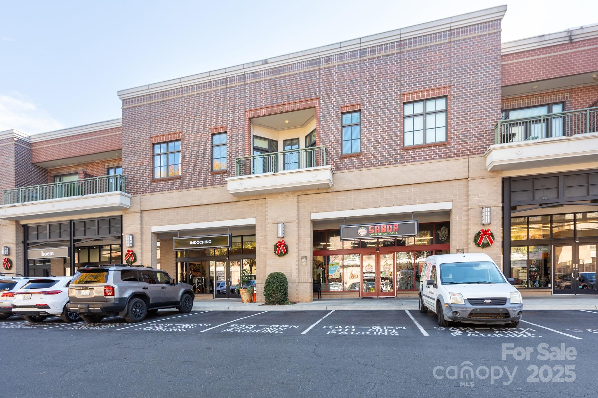 3920 Sharon Road Charlotte, NC 28211 - Photo 38 of 38 a car parked in front of a building