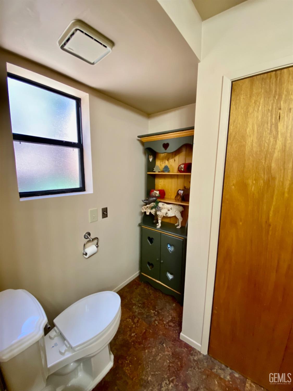 Undisclosed Address Posey, CA 93260 - Photo 13 of 35 a bathroom with a granite countertop toilet sink and mirror