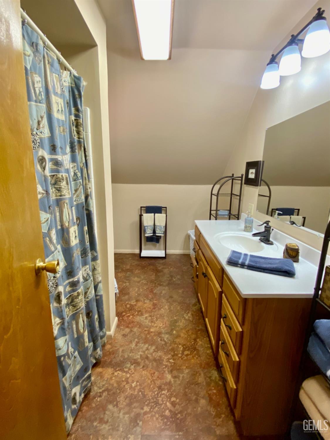 Undisclosed Address Posey, CA 93260 - Photo 22 of 35 a kitchen with a sink stove and a mirror
