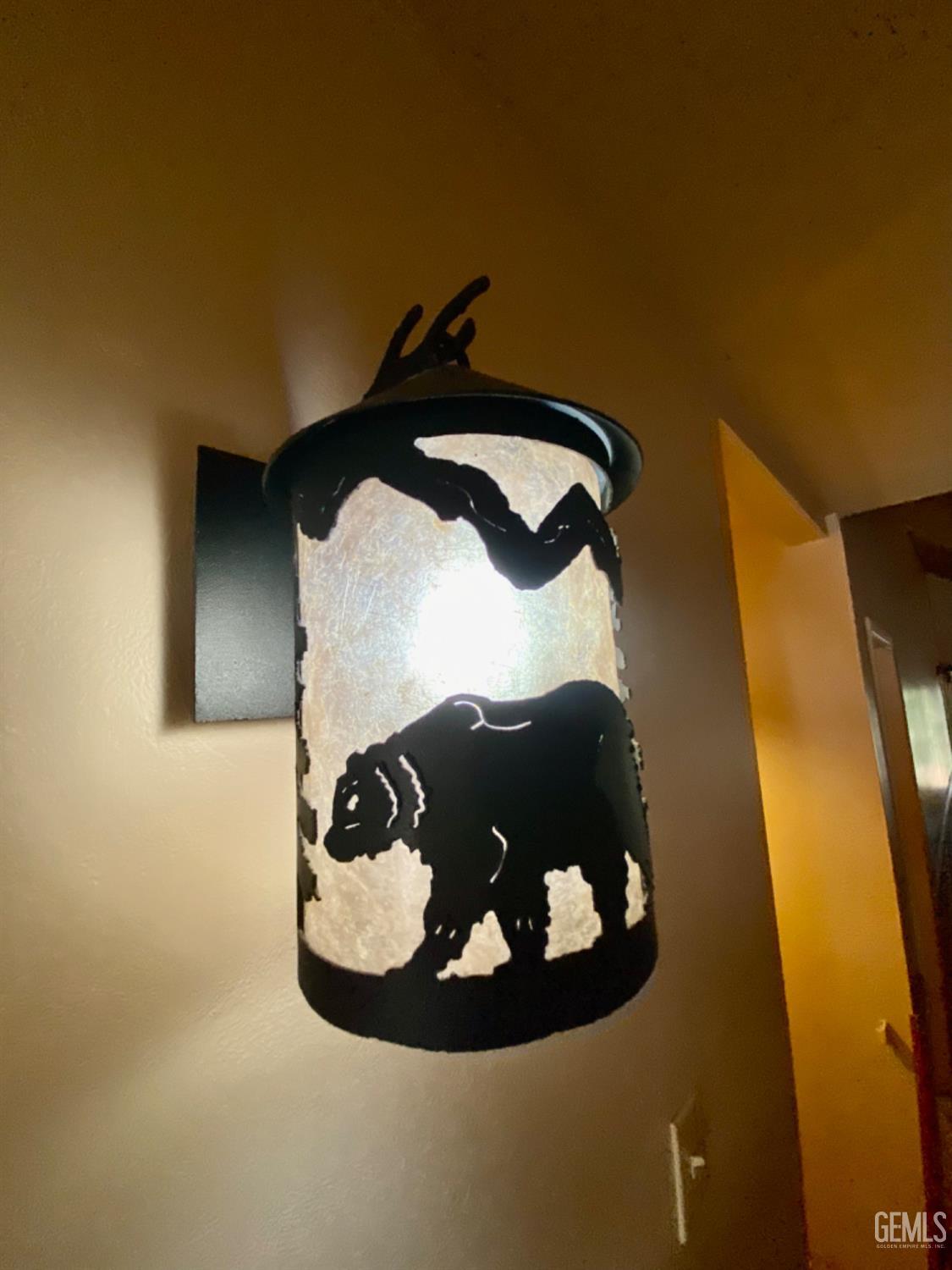 Undisclosed Address Posey, CA 93260 - Photo 23 of 35 a view of a painting of a wall in a bathroom