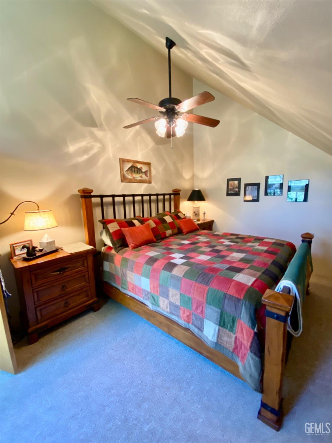 Undisclosed Address Posey, CA 93260 - Photo 25 of 35 a bed room with a bed and a ceiling fan