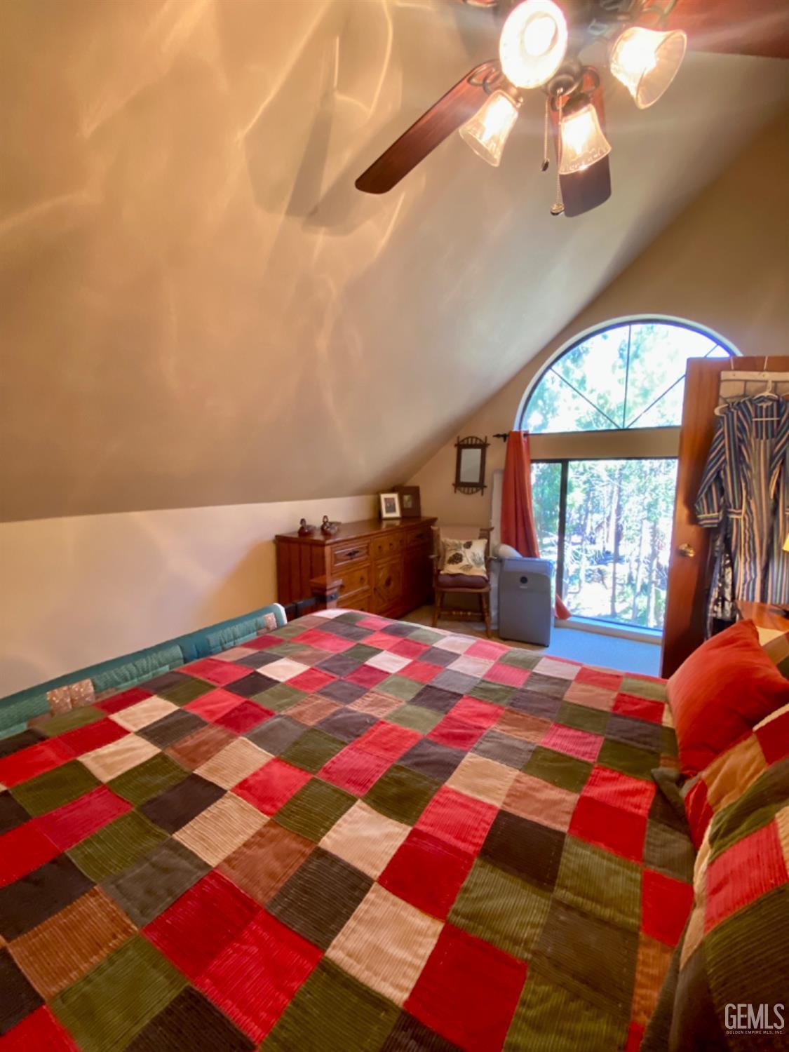 Undisclosed Address Posey, CA 93260 - Photo 26 of 35 a bedroom with a bed and a large window