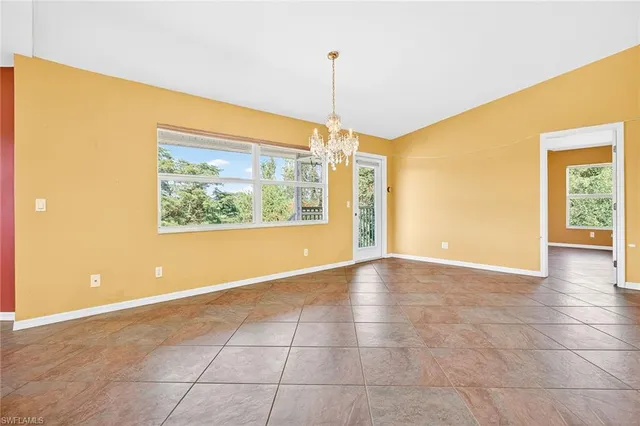 a view of an empty room with window