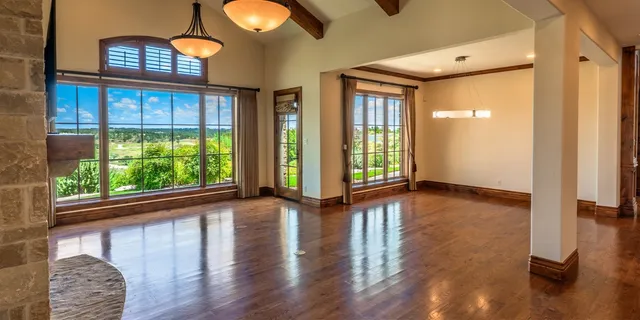 a view of livingroom with furniture and floor to ceiling window