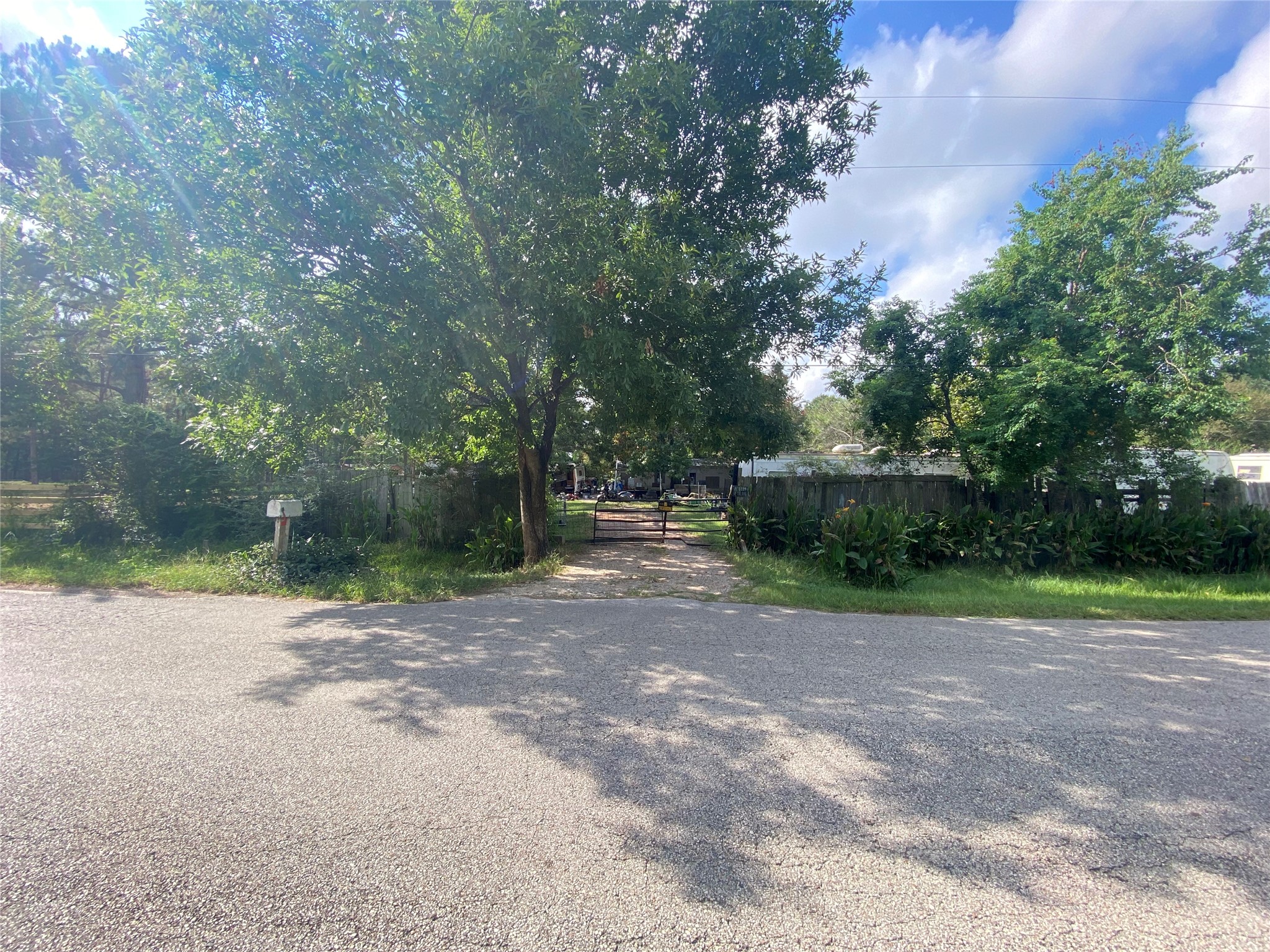 21003 Cook Road Tomball, TX 77377 - Photo 2 of 8 a view of a yard with a trees