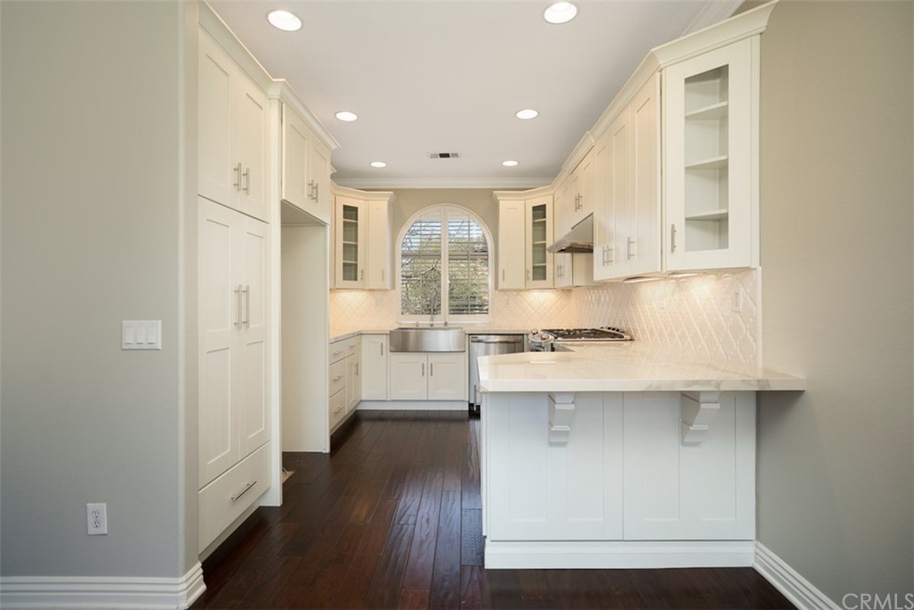 a kitchen with counter top space and a sink