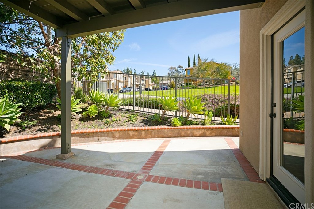 10108 Marchant Avenue Tustin, CA 92782 - Photo 12 of 15 a view of a porch and a yard