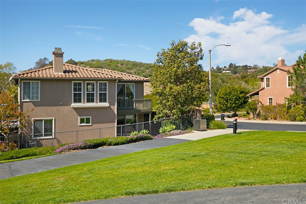 10108 Marchant Avenue Tustin, CA 92782 - Photo 13 of 15 a front view of house with yard