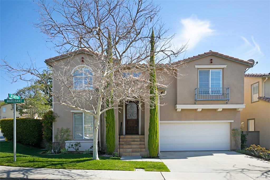10108 Marchant Avenue Tustin, CA 92782 - Photo 3 of 15 a front view of a house with garden