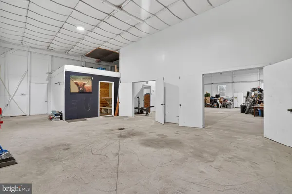 a view of a livingroom with a flat screen tv