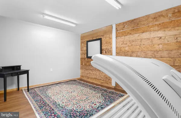 a living room with a rug