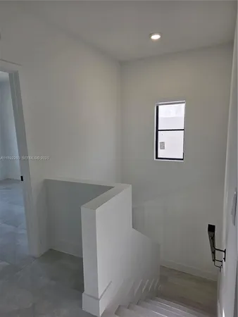 a view of entryway with stairs