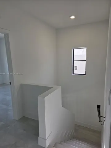 a view of entryway with stairs