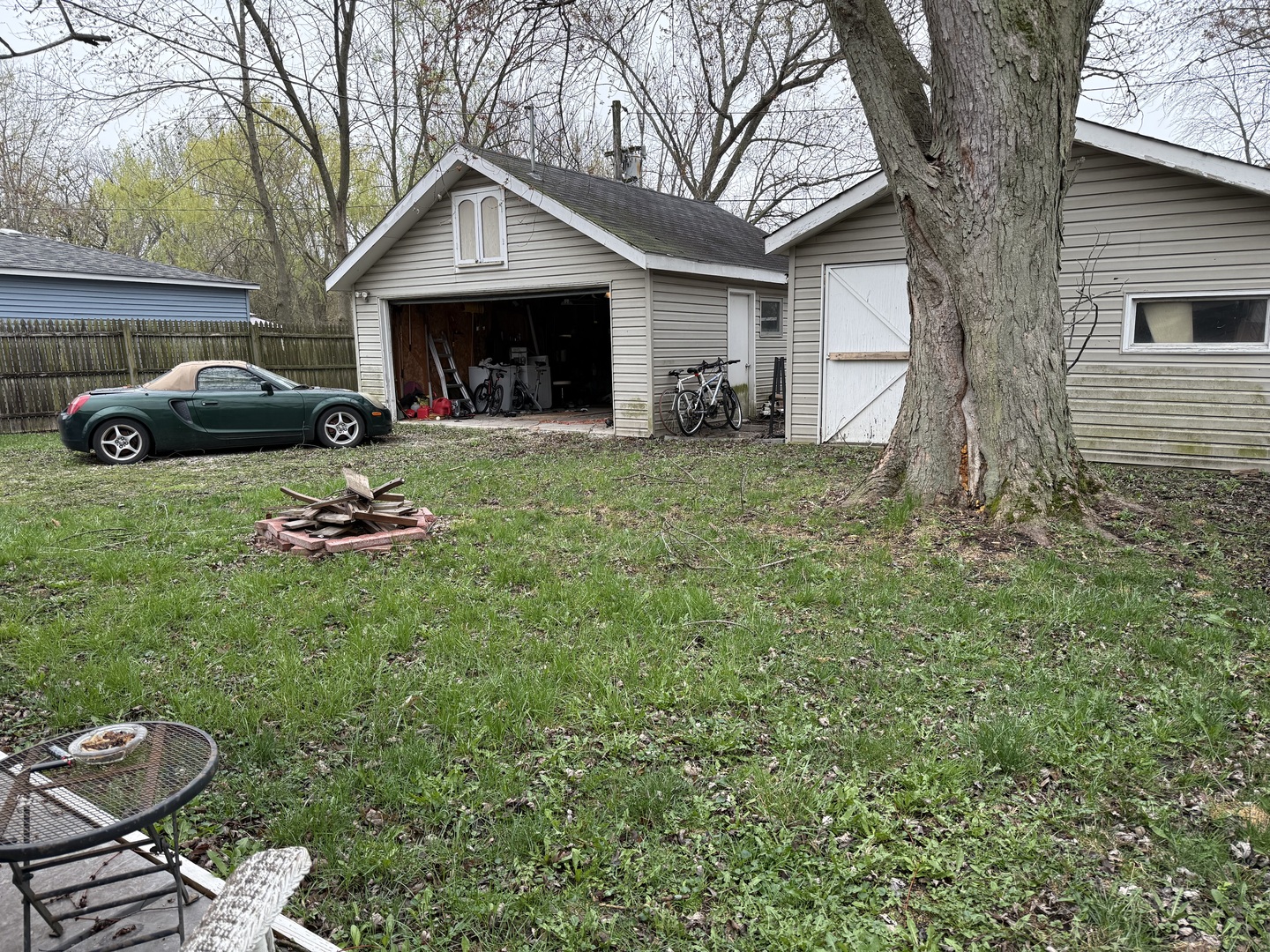 54 Apache Street Park Forest, IL 60466 - Photo 17 of 21 a front view of a house with a garden and yard