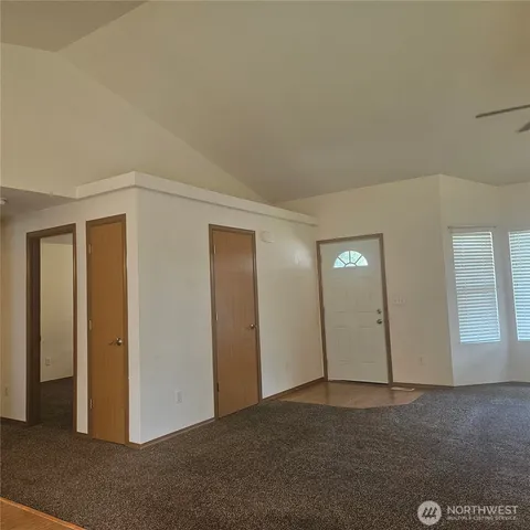 a view of an empty room and window