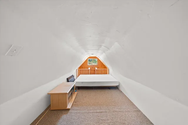 an view of swimming pool with a couch