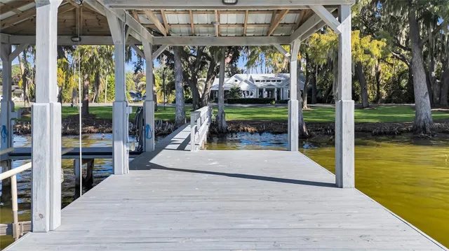 a spacious bathroom with a double vanity sink and a mirror